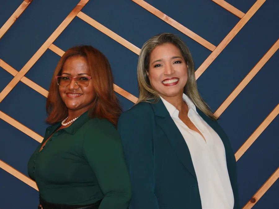 Diosalma M. Melgar and Evelyn Mateo, Melgar Law Firm team